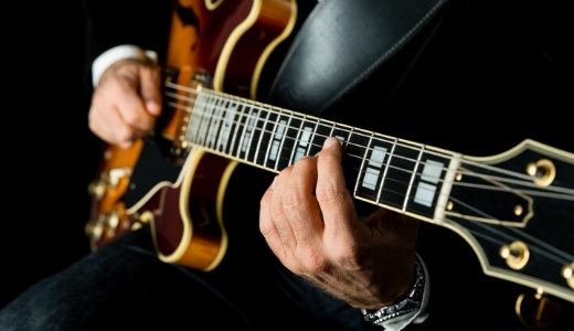 Playing guitar