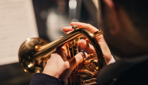 Playing trumpet