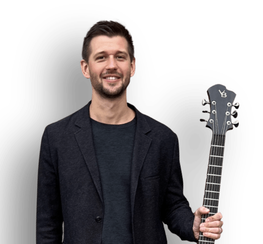 Brent holding guitar
